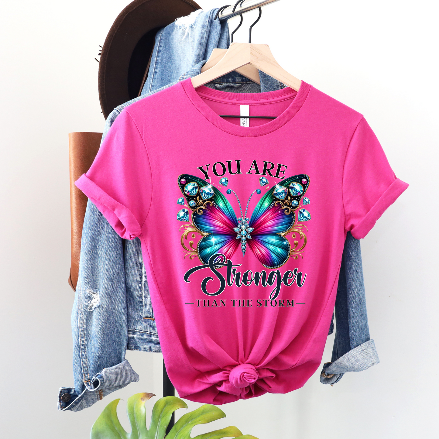 You Are Stronger Than the Storm" Butterfly Tee – Multicolor Jewel Design - Pink